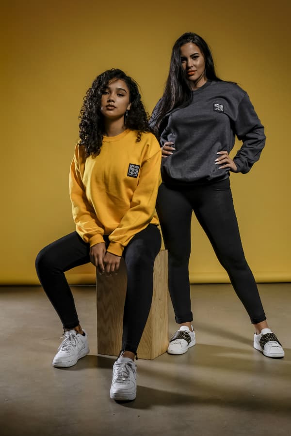 j mula posing with graffiti in background